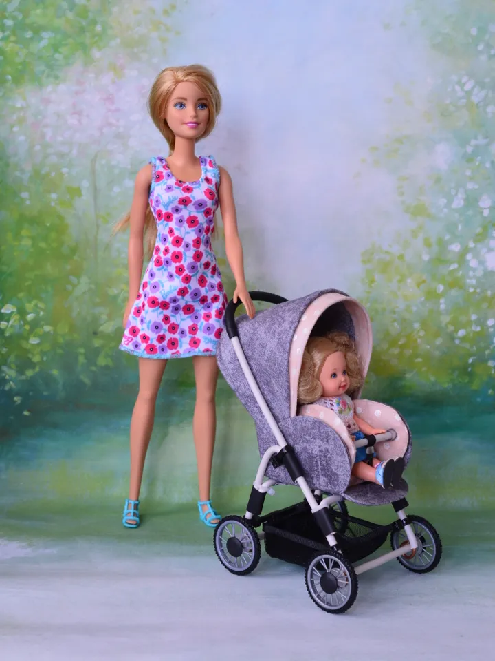 Miniature toy stroller for dolls in 1/6 scale. Accessories for small dolls and poupins. Pram for Barbie doll.