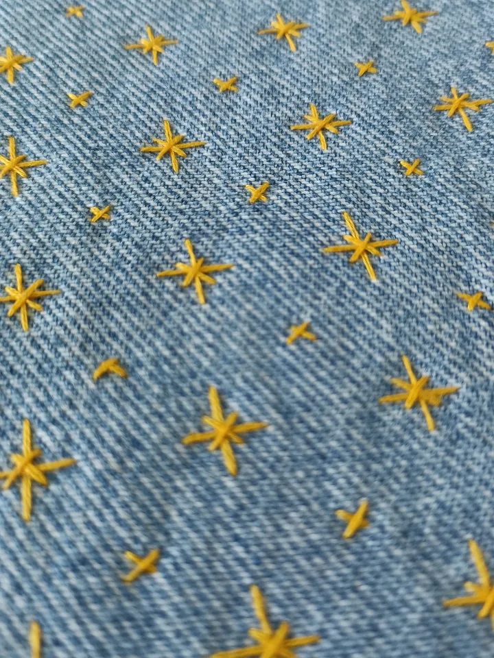 Sashiko patch hand sewn from recycled denim.