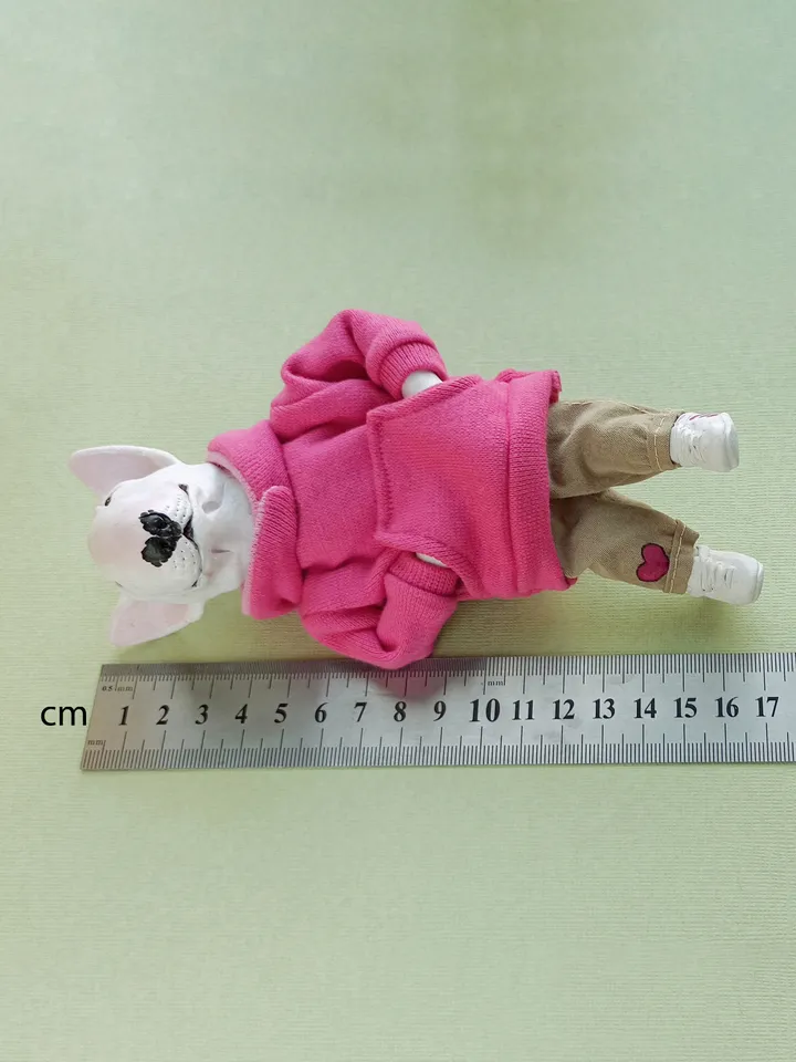 Bull Terrier doll in a pink sweater