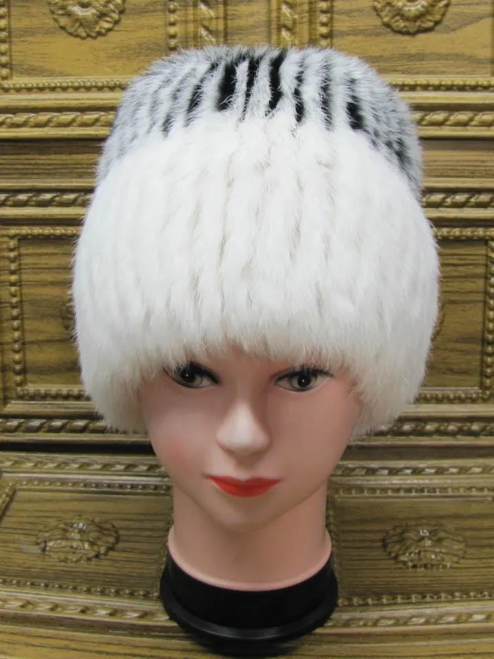 Fur hat for women made of natural rabbit fur. White warm fur hat. Winter hat for women, warm fur accessory. Natural rabbit fur