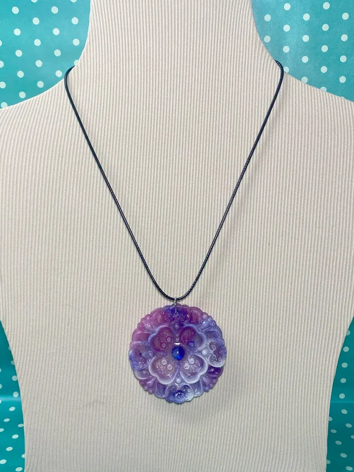 Pendant with cord. Handmade.