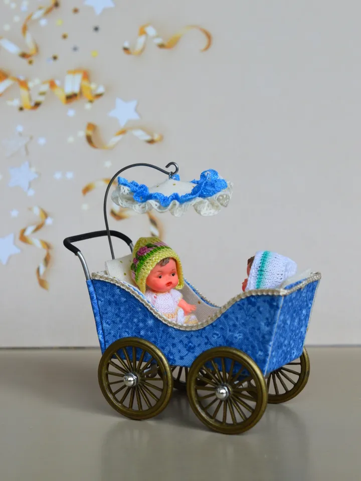 Miniature toy stroller for two small dolls. Handmade miniature stroller for small dolls.