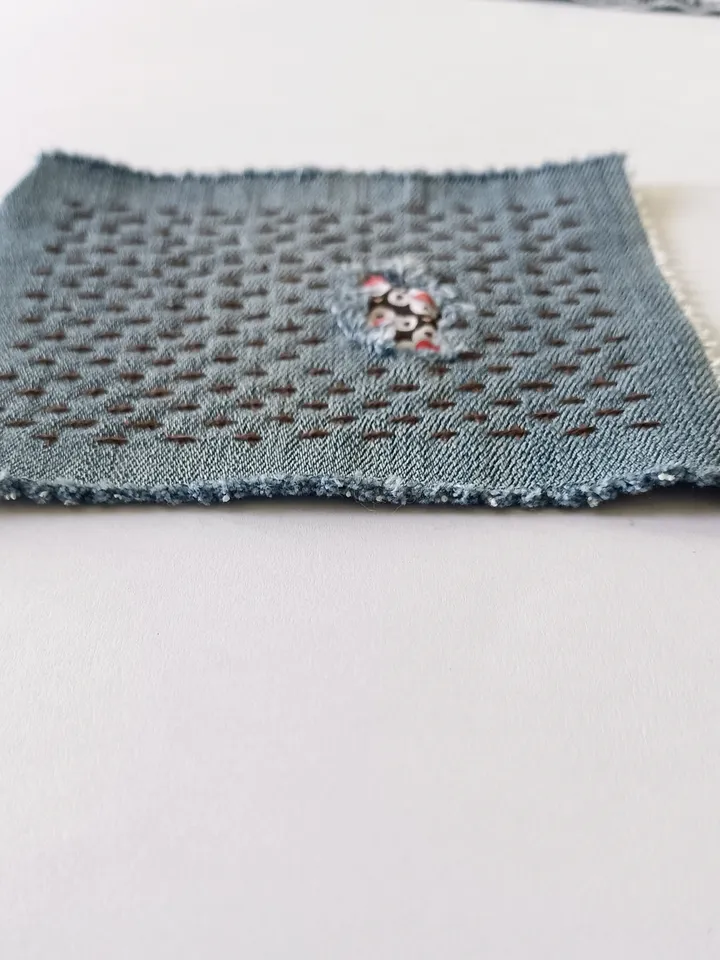 Upcycled denim boro patch. Sashiko stitching.