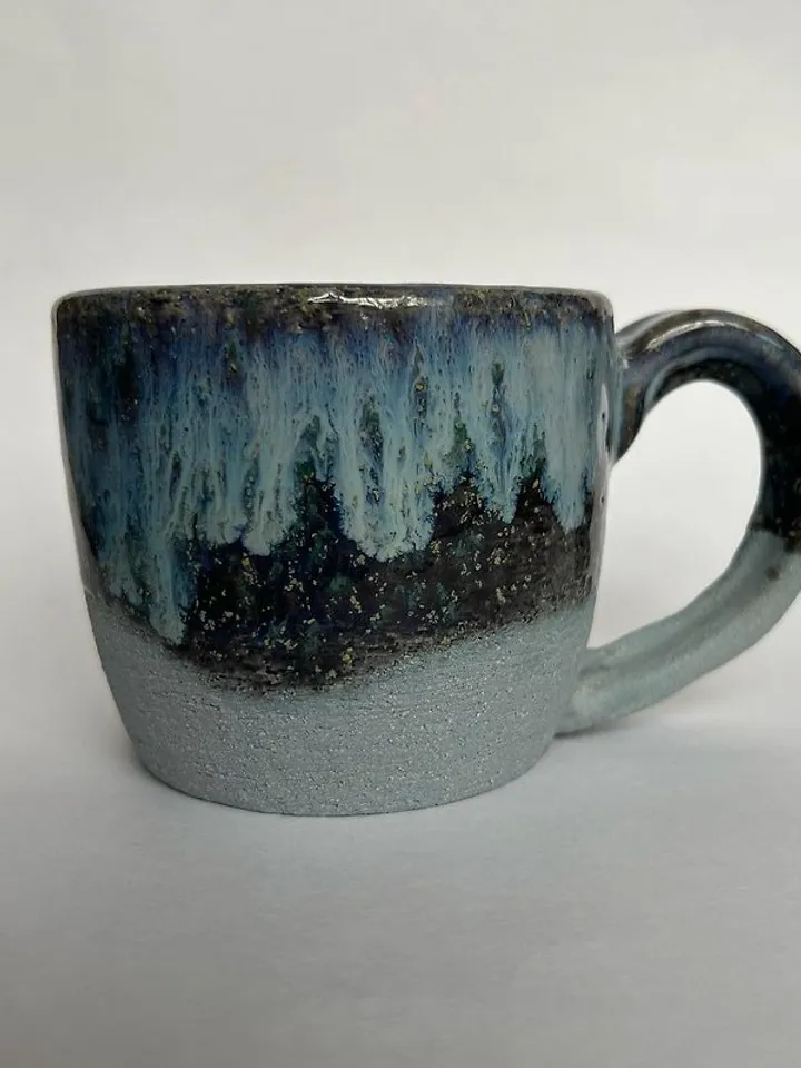 Trinity knot Triquetra in circle blue clay and black galaxy glazed stoneware mug