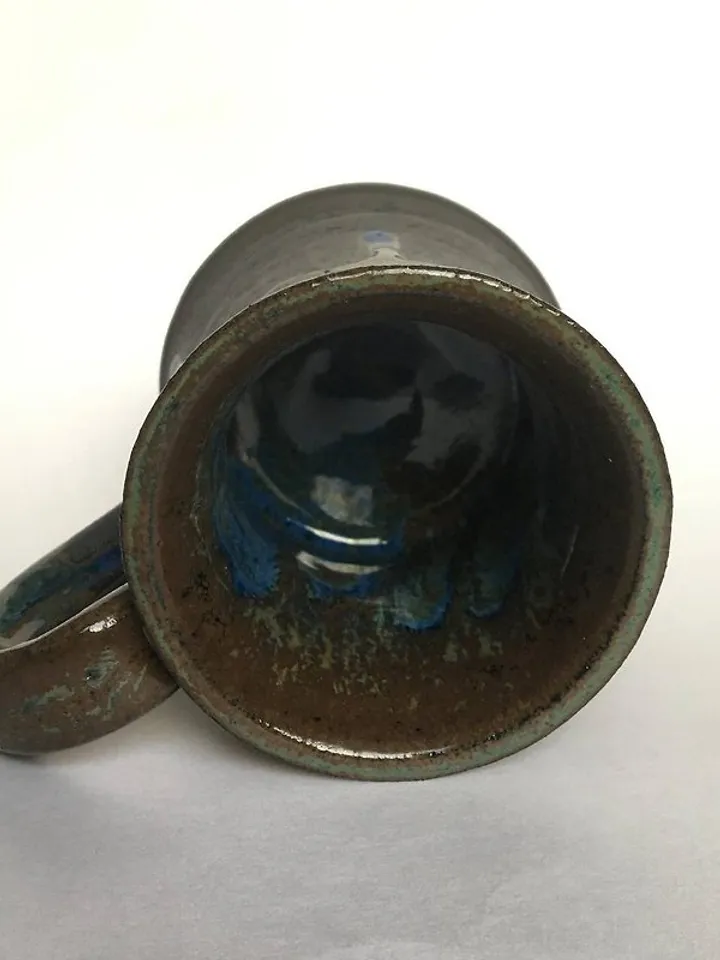 Brown, blue and black glazed stoneware mug