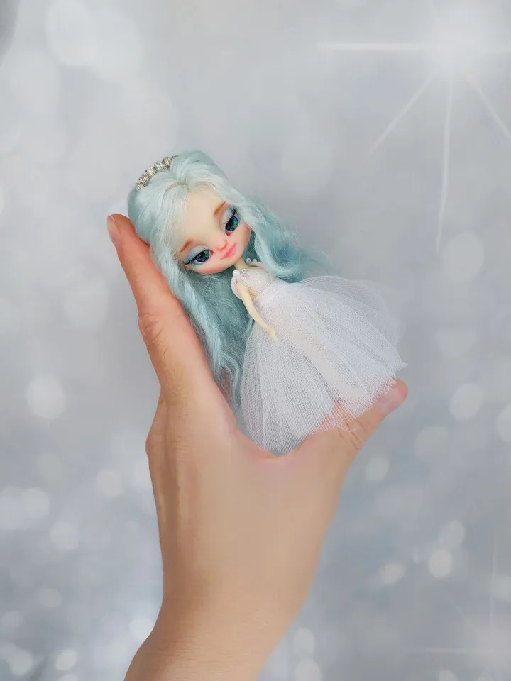 Miniature doll Blythe in the image of a beautiful princess.