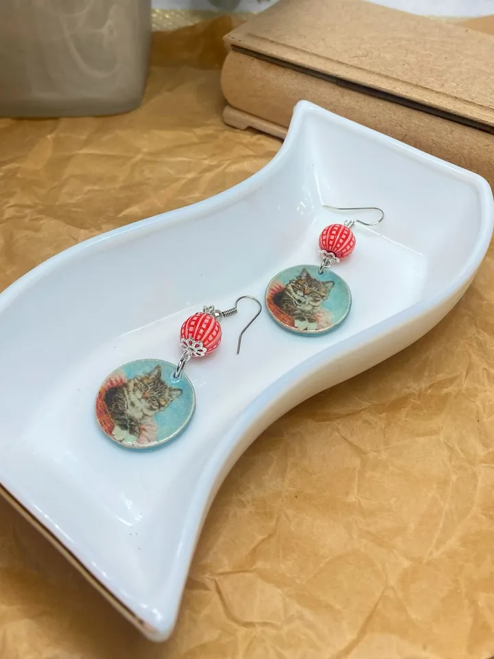 Handmade earrings. Earrings with beads. Handmade. Author's design. Earrings with images of cats.