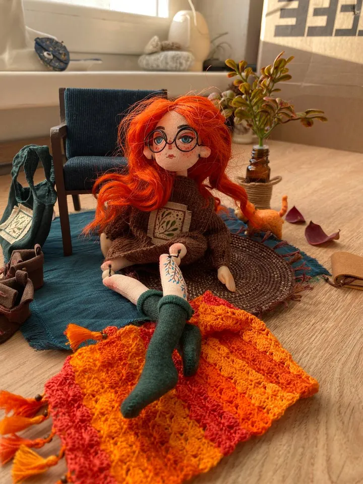 Red-haired doll with goblincore and cottagecore style with tattoos