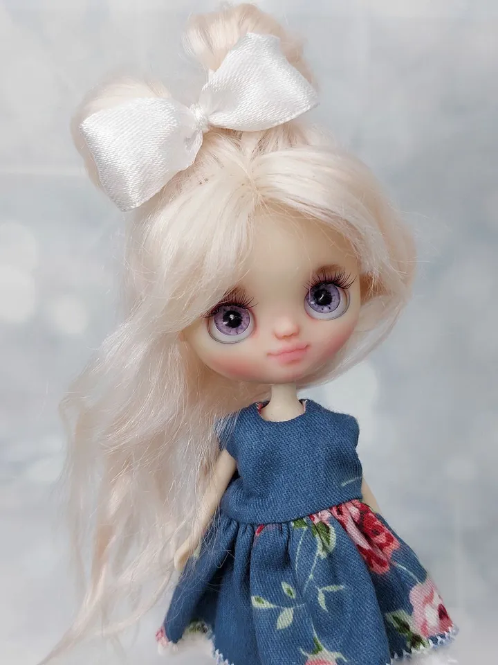 Cute little doll Blythe with light pink hair
