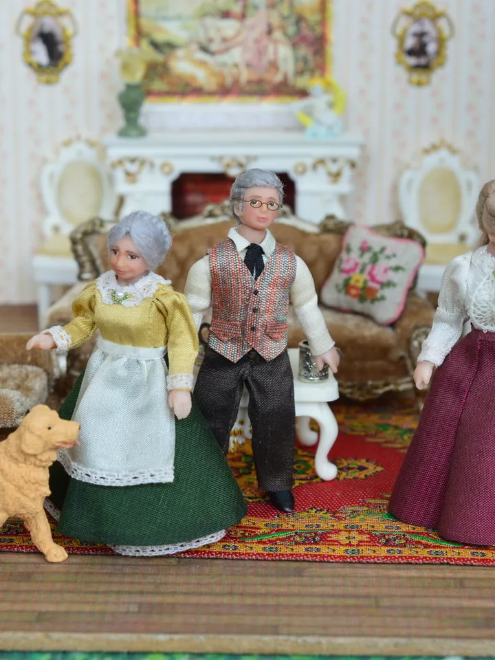 Man doll in 1/24 scale. Miniature doll for a dollhouse.