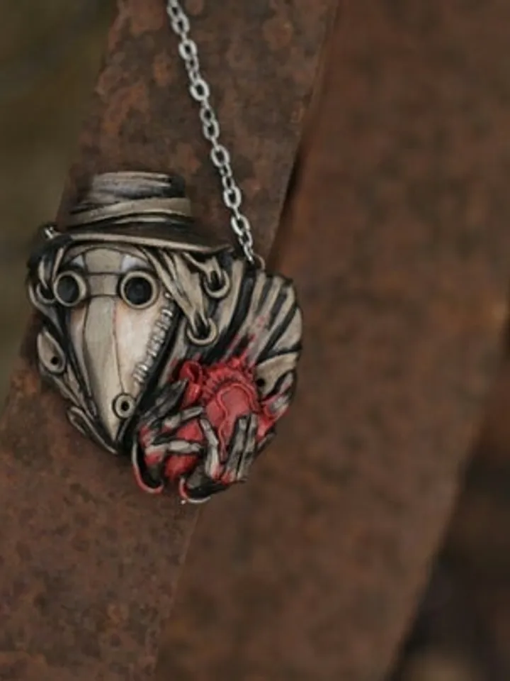 Pens "plague doctor with heart in hand"