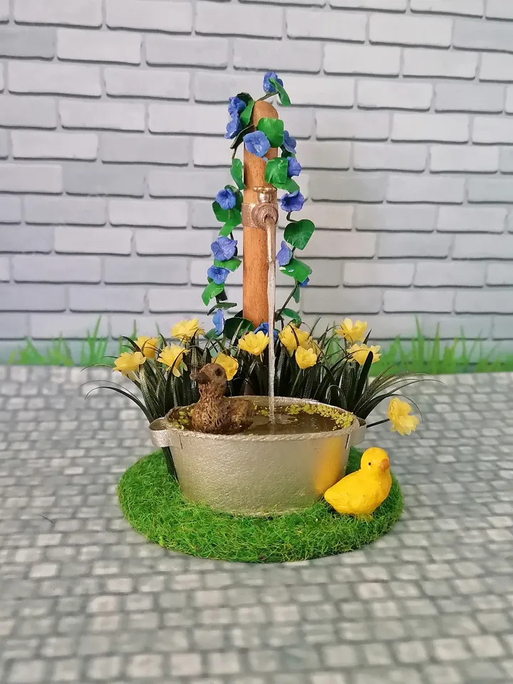 Composition for a puppet garden. Dollhouse miniature 1:12.