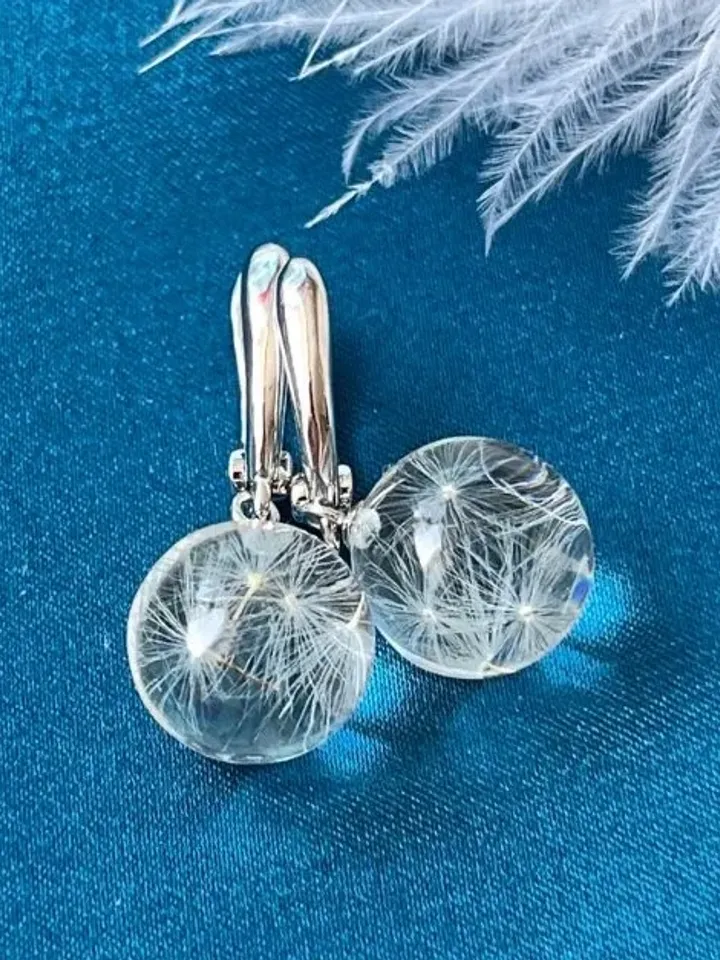 Handmade epoxy resin earrings with dandelion fluffs