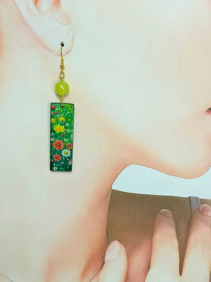 Earrings with luminous beads. Handmade jewelry.