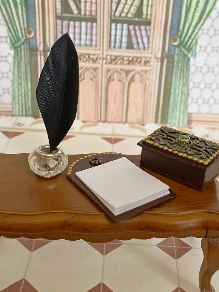 Dollhouse set. Inkwell with feather.