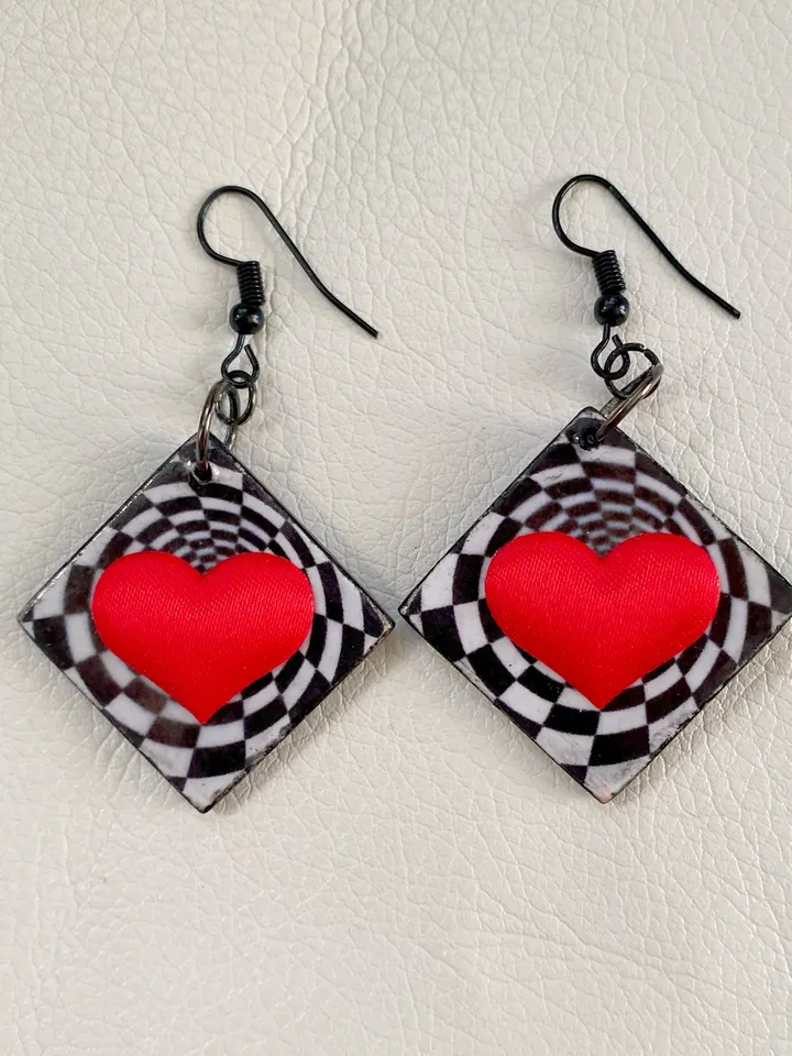 Bright handmade earrings. Handmade jewelry. Author's design. Earrings with bright hearts.