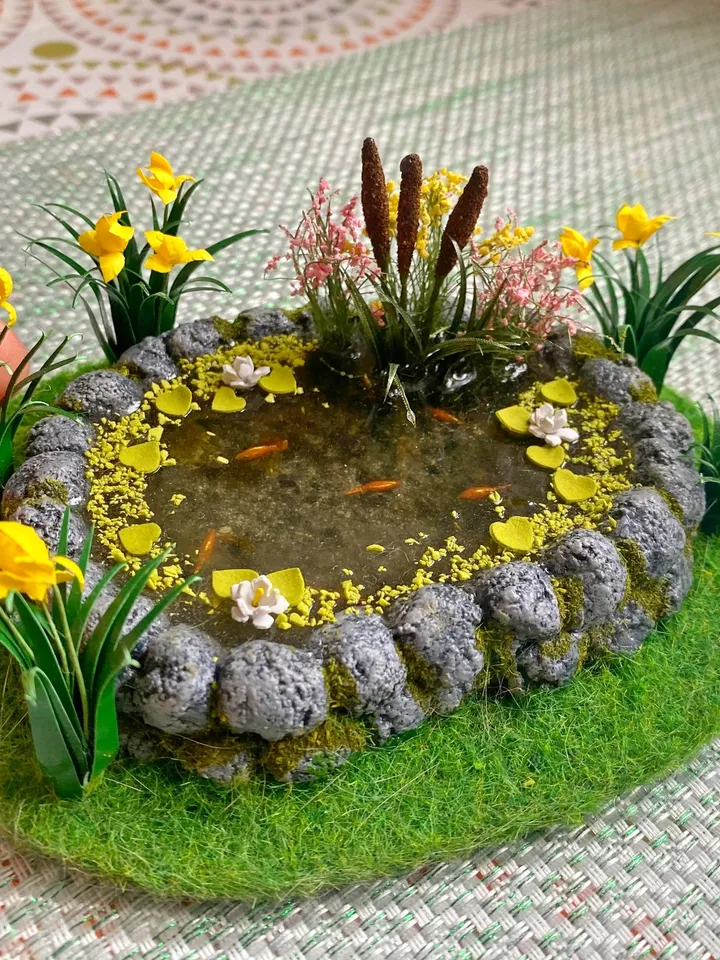 Miniature pond with goldfish. Dollhouse miniature. 1:12. Handmade pond. Pond with irises and fish.
