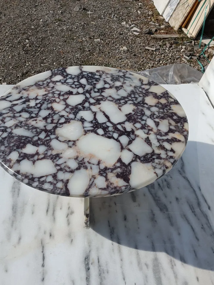 Calacatta Viola Coffee Table is Real Marble and everything is marble, including the Italian model handmade legs.