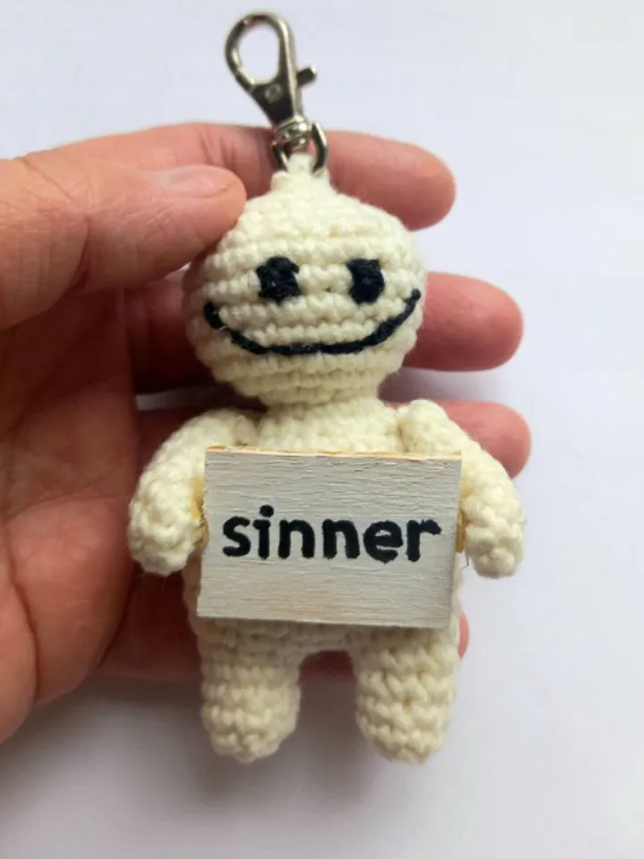 The keychain "sinner" for a bag or keys, a toy in the car interior, a pendant for the rearview mirror.