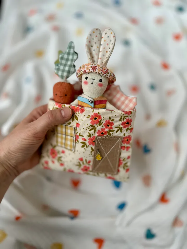Sewing pattern hare with clothes and house