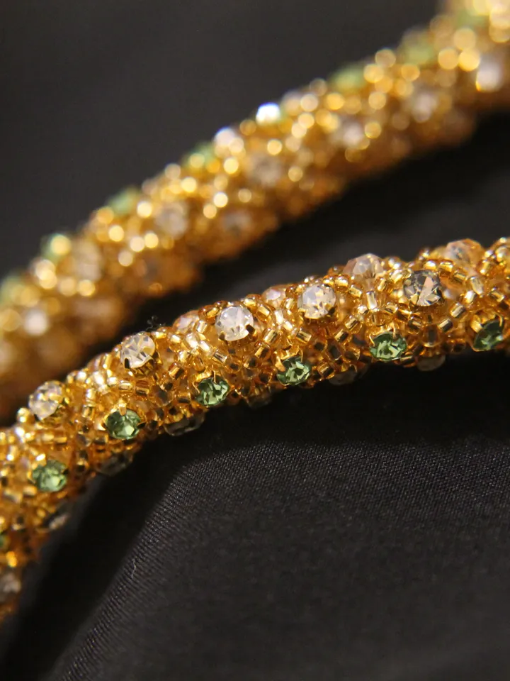 Pendant Japanese beads with a coil and rhinestones