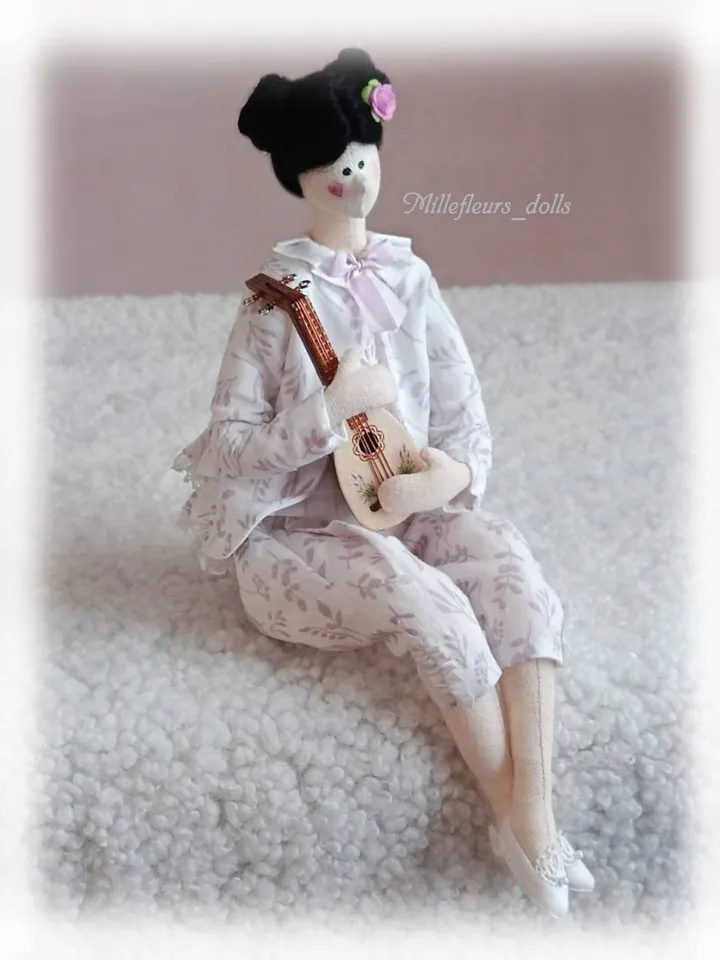 Author's doll made of Colombine fabric