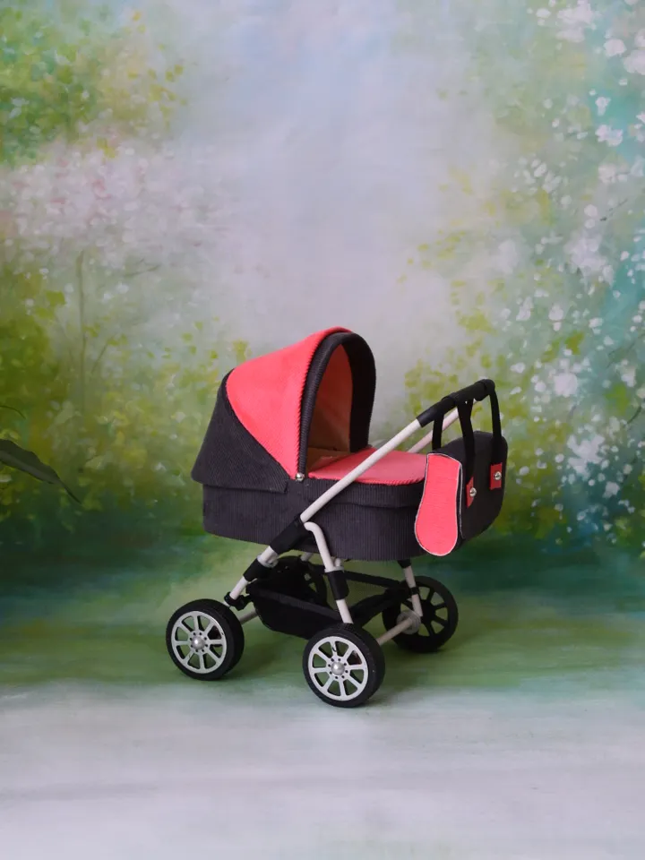Miniature toy stroller for Barbie dolls.