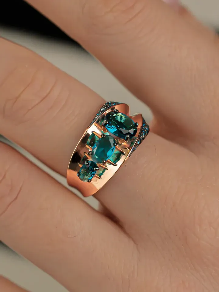 Ring Silver gold plated 925 assay value with London topaz and blue cubic zirconia