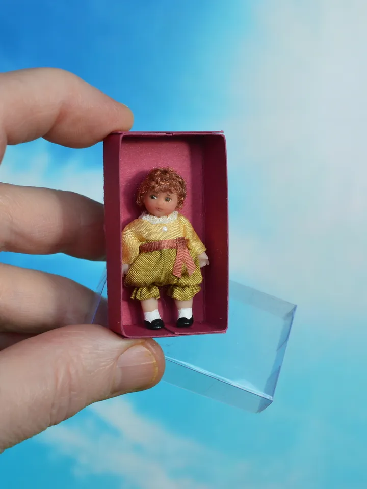 Miniature doll in 1/24 scale.  Doll toy to doll house.