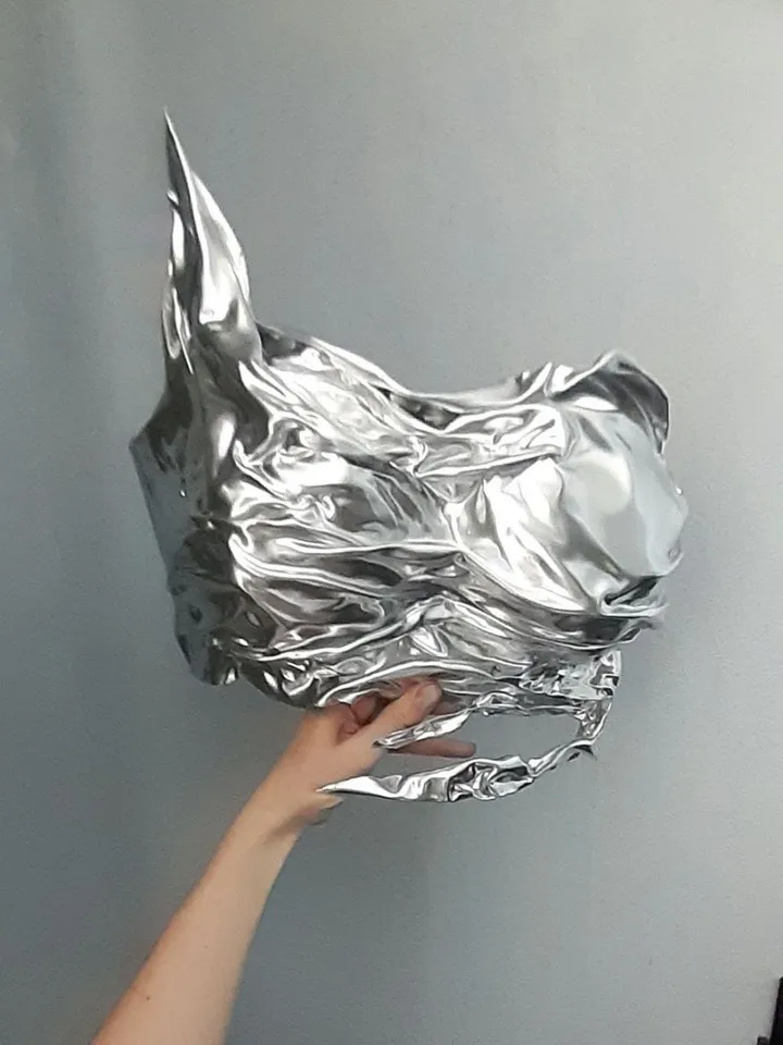Chrome-plated armored top bando for women in a bikini