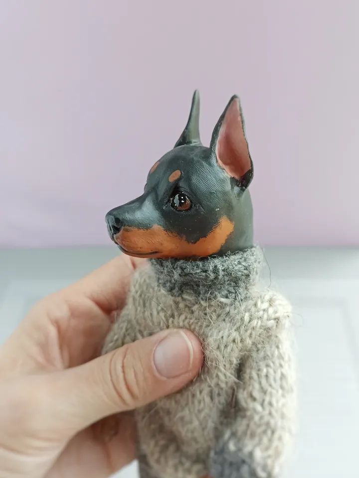 a doberman pinscher doll