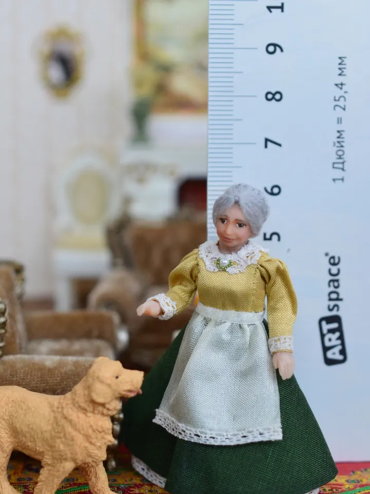 Miniature dolls in 24th scale. A grandmother with a baby for a dollhouse.