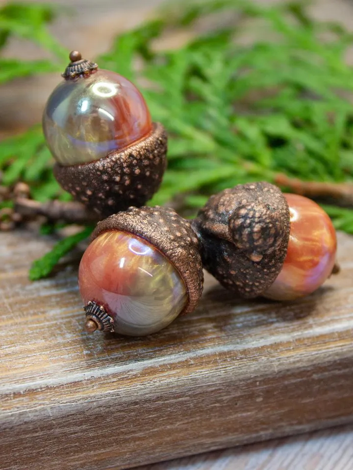 An original handmade electroformed copper pendant made from natural acorn caps in a single copy.