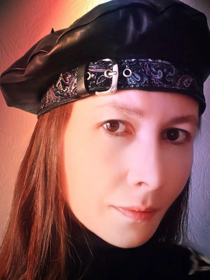 Beret of soft genuine leather with applique, decorated with a buckle. Leather hat for spring