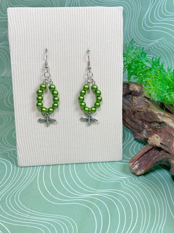 Earrings with green flies. Handmade jewelry.
