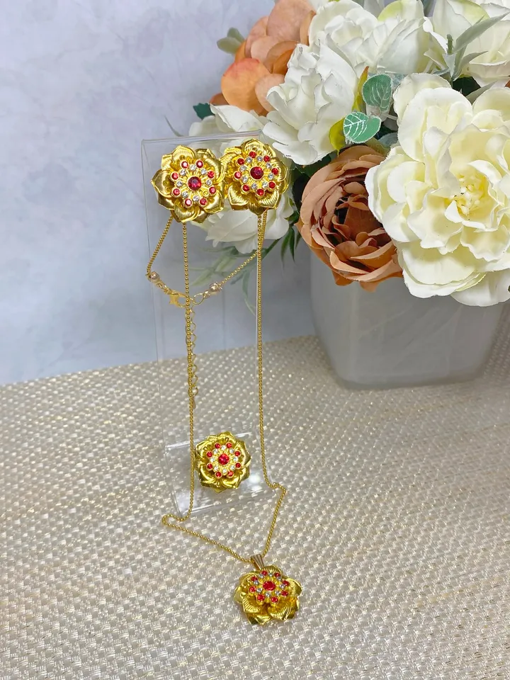 Set of jewelry with red rhinestones. Handmade. Jewelry.