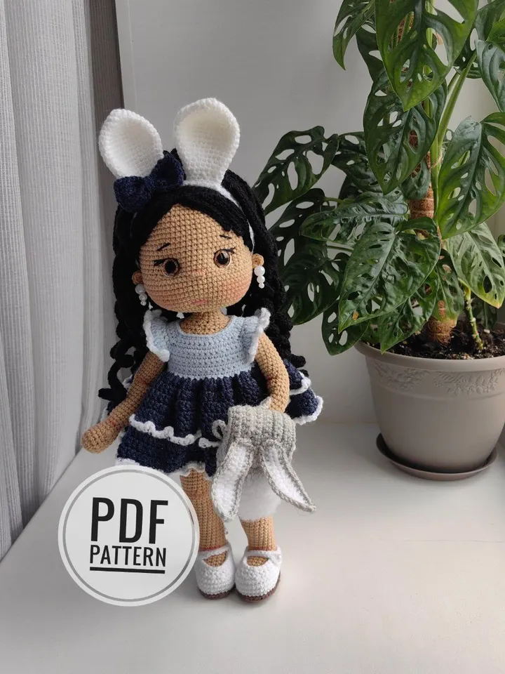 Crochet pattern doll with a dress and a backpack