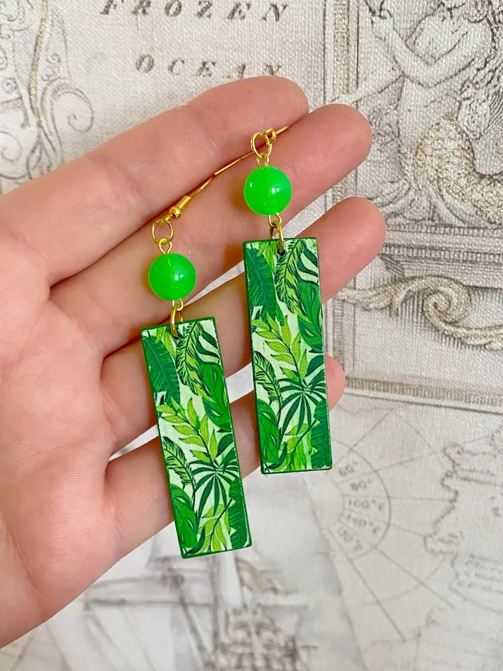 Earrings with luminous beads. Handmade jewelry.