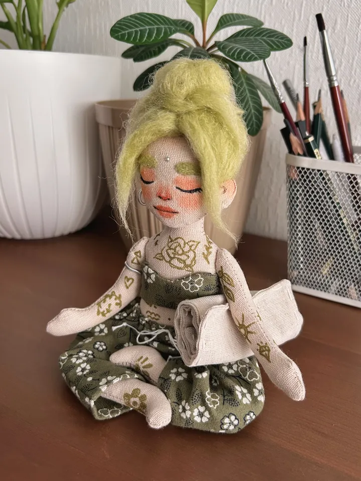 Textile doll yoga girl with green hair and tattoo