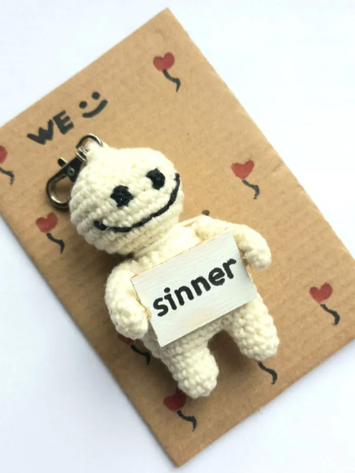 The keychain "sinner" for a bag or keys, a toy in the car interior, a pendant for the rearview mirror.
