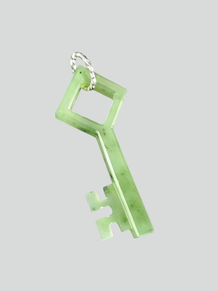 Skeleton green jade key good luck charm pendant.