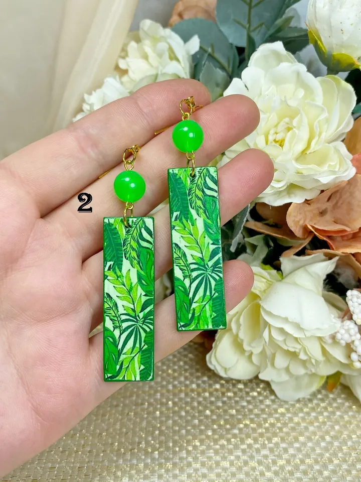 Earrings with luminous beads. Handmade jewelry.