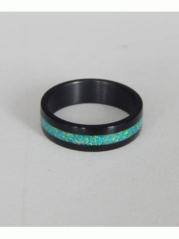 Stylish black ring. Carbon ring with synthetic opal. 9 1/4