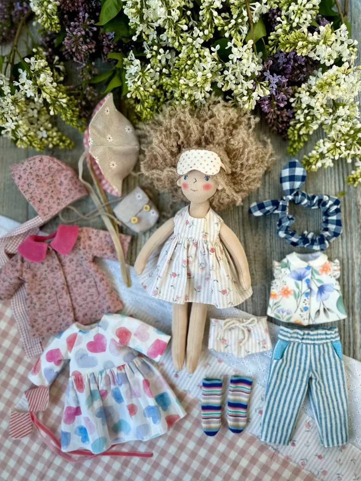 Patterns in PDF of clothes for a doll 31 (12 inch) cm tall.