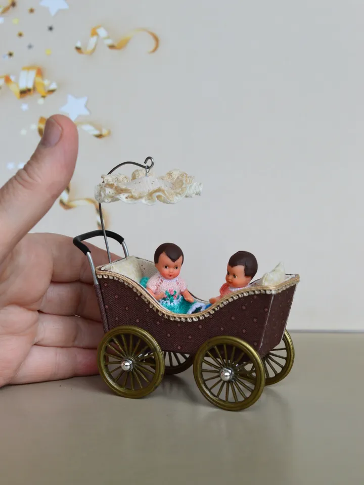 Miniature toy stroller for two small dolls. Handmade miniature stroller for small dolls.