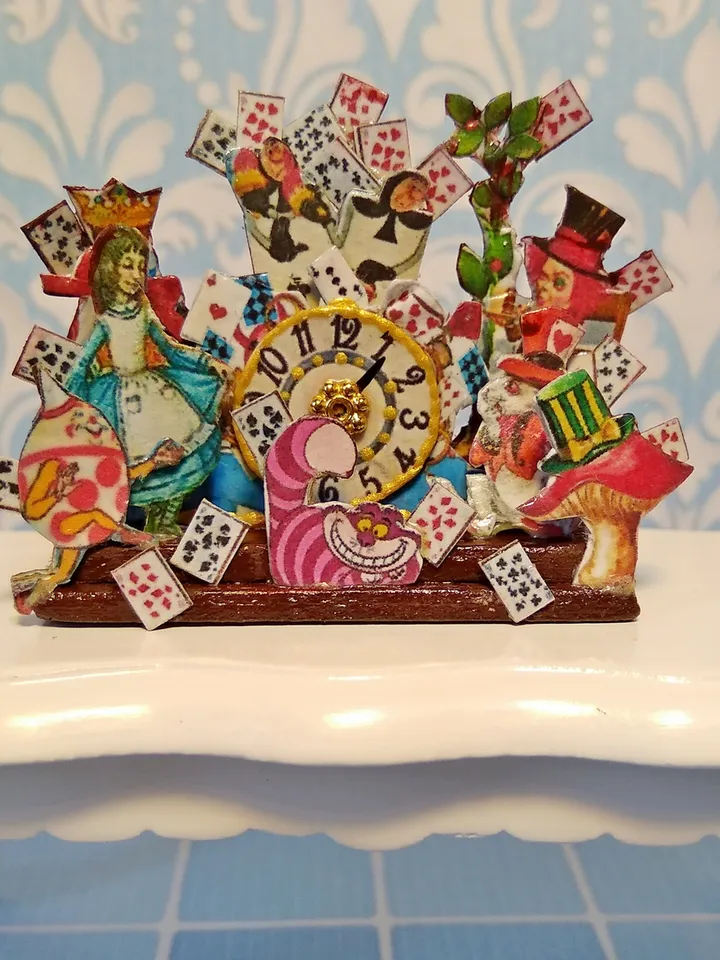 Imitation of a clock in the style of a fairy tale Alice.1:12 scale.