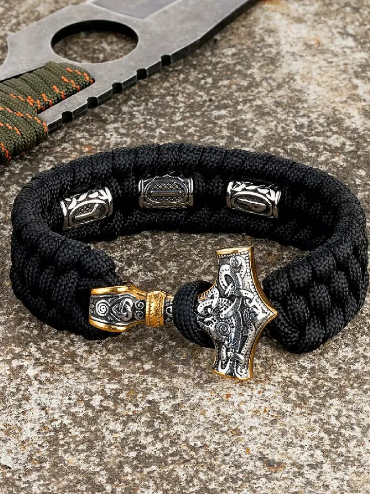 Paracord and stainless steel bracelet with Celtic runes and Thor's hammer