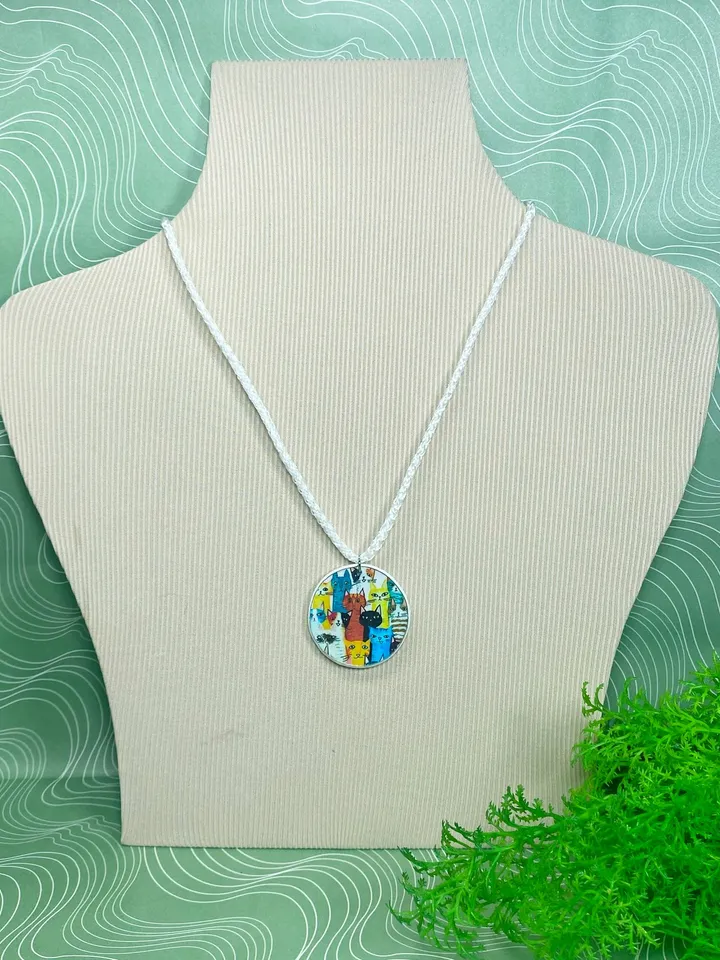 Pendant with kittens. Necklace. Handmade jewelry.Pendant on a cord. Author's design.