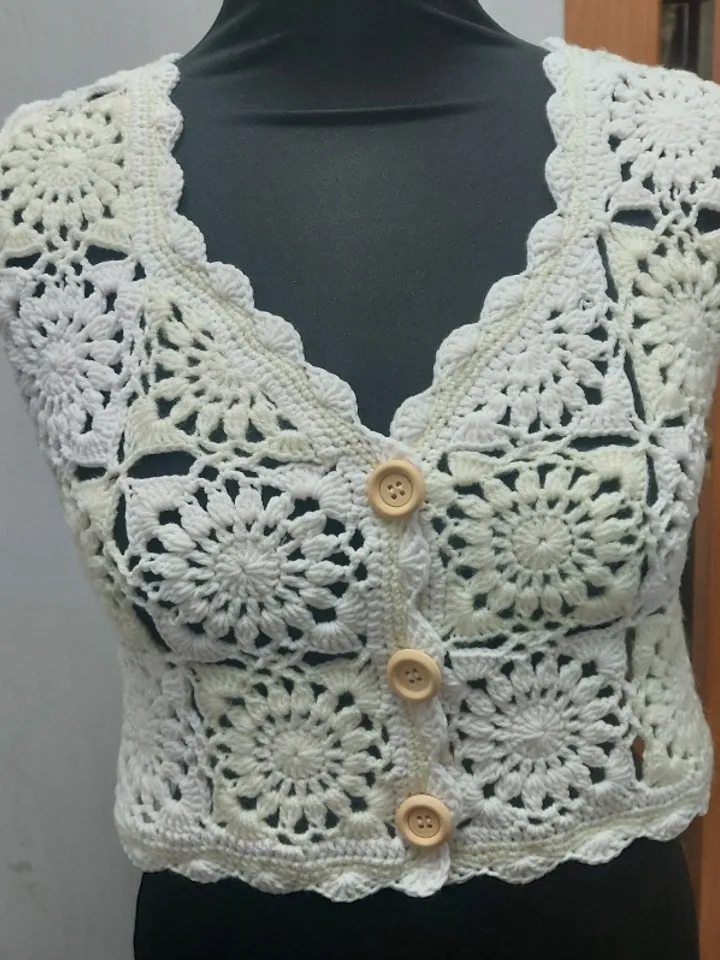 Handmade vest from granny square in boho and retro style