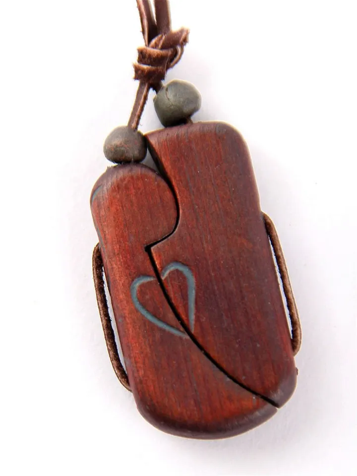 Jewelry pendant on the neck Bonds "Prima". Ornament from the Altai cedar